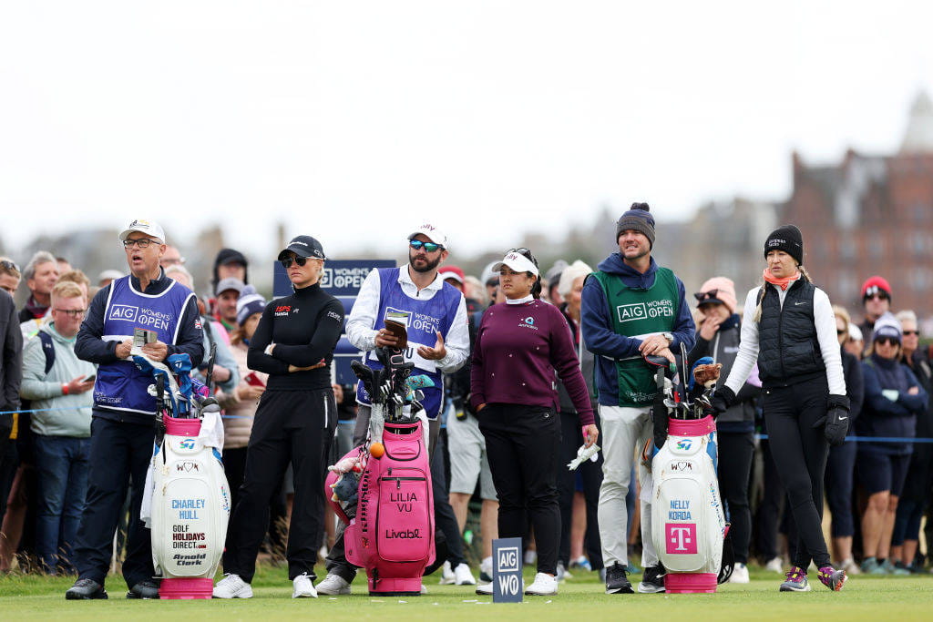 Charley Hull of England, Lilia Vu of the United States and Nelly Korda of the United States look across the third tee during Day One of the AIG Women
